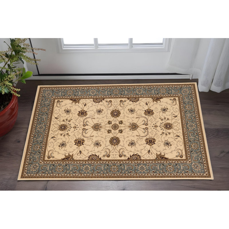 2' X 4' Beige And Cream Oriental Area Rug