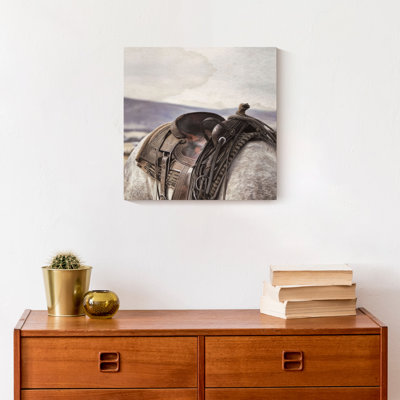 Cheval et selle sur toile