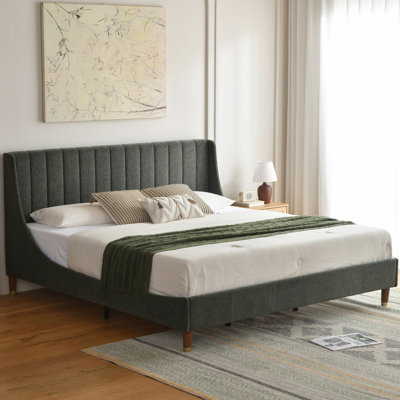 Linvel Upholstered Wingback Platform Bed