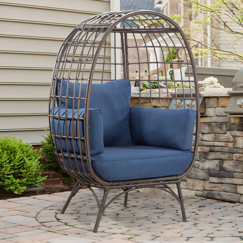 Fauteuil de patio avec coussins Cuccia, Bleu, Brun