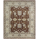 Misael Wool Oriental Area Rug in Brown/Ivory