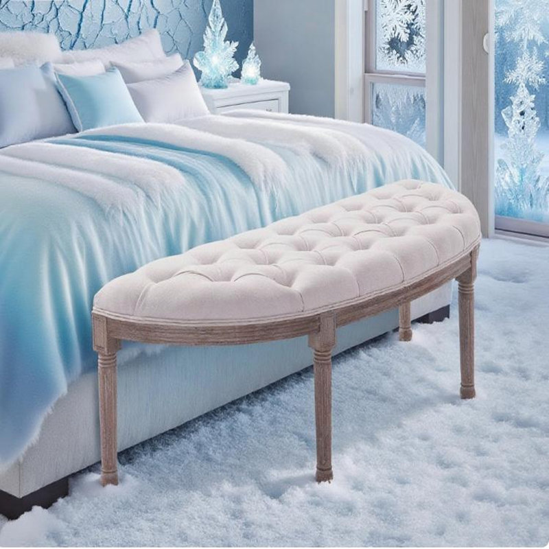 Banc de bout de lit tapissier à l'extrémité du lit