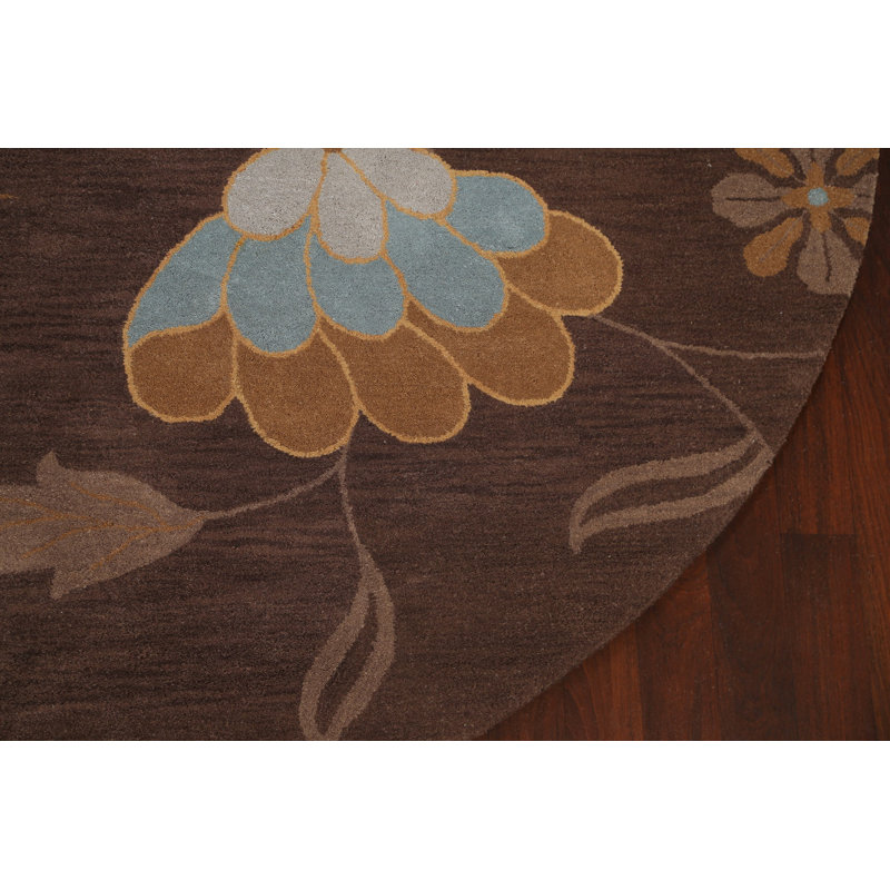 Tapis rond brun en laine touffeté à la main