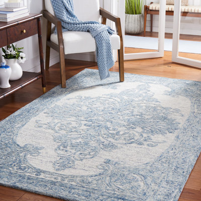 Tapis bleu / ivoire Metro 616