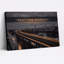 «Golden Light Trails On Curved Highway Over City Skyline», art mural sur toile-1264293570