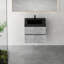 Meuble-lavabo suspendu de 61 cm (24 po), lavabo en quartz noir sable, armoire gris ciment, tiroirs à fermeture amortie, esthétique moderne, gain de place, installation facile, construction robuste, rangement de l'eau, finition élégante.