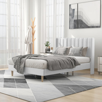 Sutter Upholstered Wingback Bed