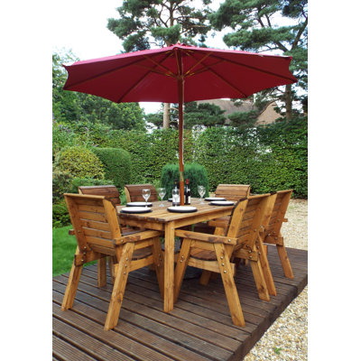 Faulkner 6 - Person Solid Wood Patio Dining Set Umbrella Hole Included Rectangular Table with Cushions Included