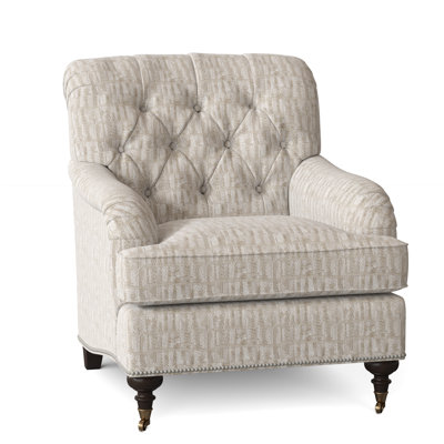 Fauteuil à coussin en duvet capitonné Devan