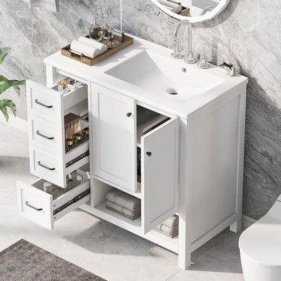 Meuble-lavabo durable avec lavabo en céramique, deux portes et deux tiroirs, idéal pour les salles de bain modernes et élégantes.