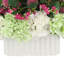 Hortensias et dahlias dans un vase plissé