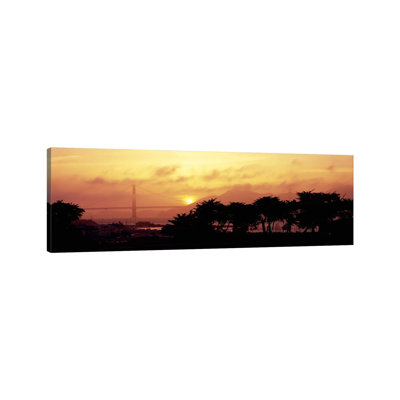 Silhouette Of Trees At Dusk With A Bridge In The Background, Golden Gate Bridge - Wrapped Canvas Panoramic Print