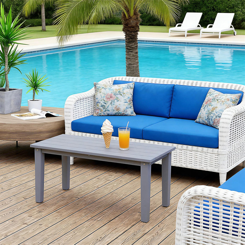 Table basse d'extérieur rectangulaire avec conception à lattes et fabrication en PEHD résistant aux intempéries pour une utilisation durable du patio