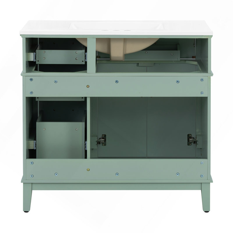 Évier 36 po en céramique vert clair, porte à fermeture en douceur et 4 tiroirs de rangement, offrant un look raffiné avec une fonctionnalité pratique quotidienne.