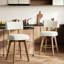 Tabouret de bar pivotant rembourré avec structure en bois massif et repose-pieds plaqué or-129235219