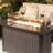  Outdoor 43-inch 50,000 BTU Propane Gas Fire Pit Table, Aluminum Tabletop and PE Rattan Weaved Iron Frame, Glass Fire Pit Wind Guard, Glass Beads, Lid Included, Dark Brown Color