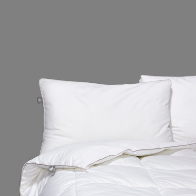 Oreiller de soutien ferme en duvet synthétique