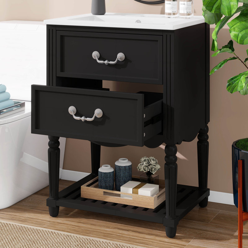 Meuble-lavabo de 24 po avec lavabo en céramique, armoire munie de deux tiroirs à fermeture en douceur et d'une tablette ouverte, mettant en valeur l'élégance rétro