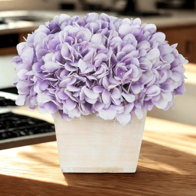Arrangement d'hortensias lavande en pot synthétique