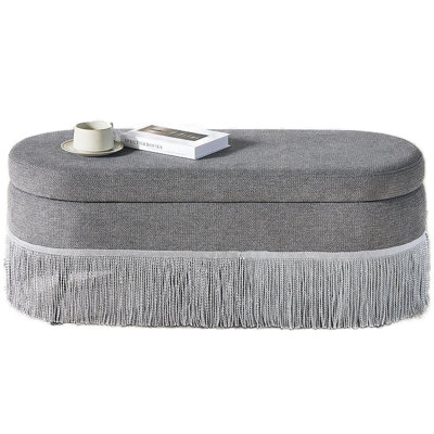 Oval Upholstered Storage Ottoman with Fringe Trim & Lift-Top Lid - 39"L x 16"W x 17"H, Multi-Functional Footrest & Hidden Storage for Living Room or Bedroom - Grey Fabric with Metal Frame