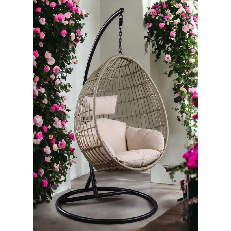 Chaise suspendue d'extérieur avec support en tissu et osier Dakarai