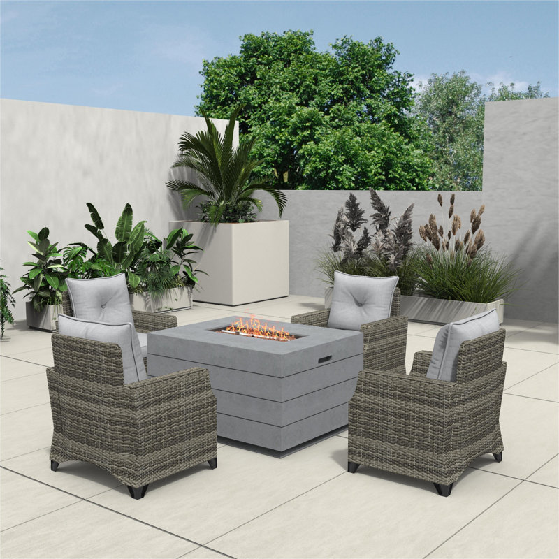 Schwerin Wicker 4 - Person Patio Conversation Set with Cushions