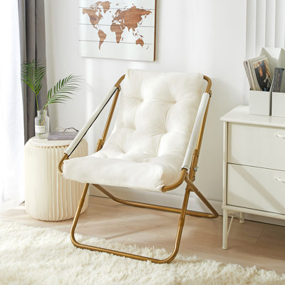 Chaise pliante capitonnée en velours