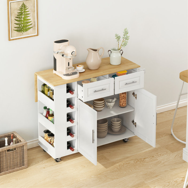 Chariot multifonctionnel pour îlot de cuisine avec armoire à 2 portes et deux tiroirs, support à épices, porte-serviette, support à vin et plateau de table en bois d'hévéa pliable