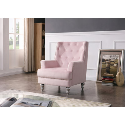 Charmant fauteuil traditionnel à accoudoirs ronds