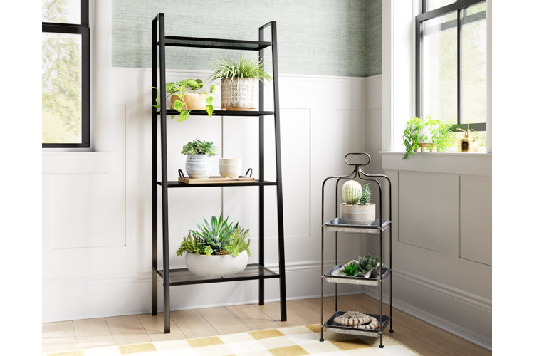An indoor plant stand with a variety of different artificial plants from how to choose the right faux plant for your home