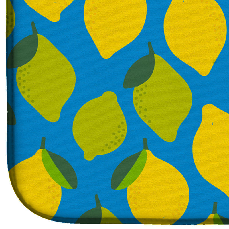 Citrons et limes sur tapis de séchage, Bleu