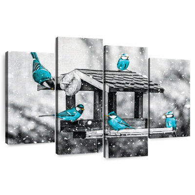 Seins bleus sur une mangeoire d'oiseaux