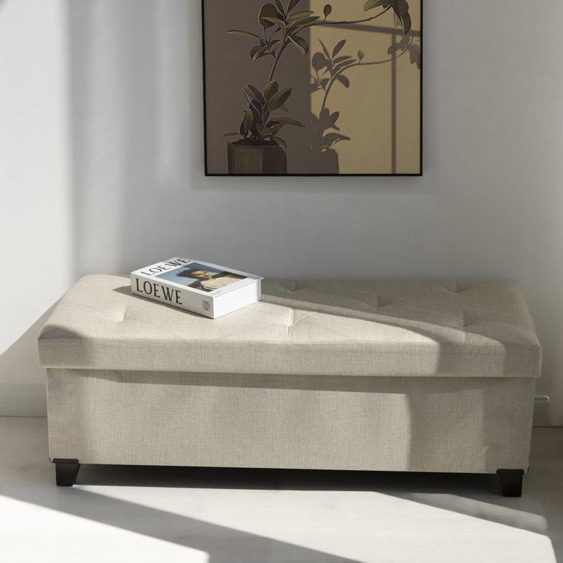 Banc de rangement rembourré avec pieds en bois massif Jenaya, Beige