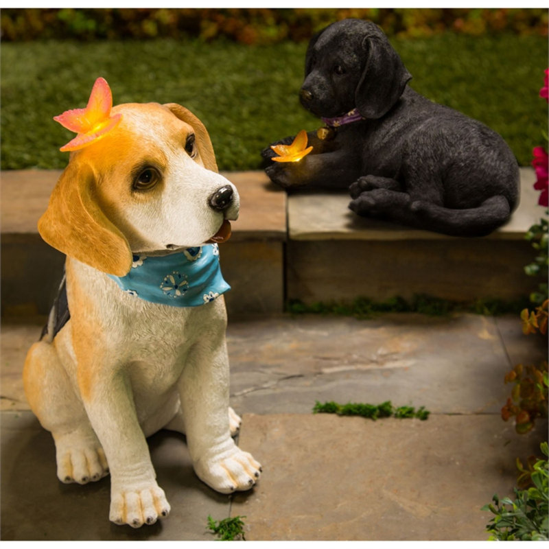 Statue de jardin chien noir avec papillon