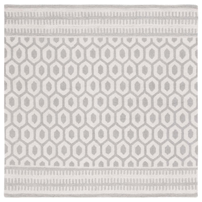 Tapis ivoire / gris Capri 708