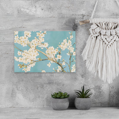 White Blossoms Blue Sky by Melloi Art Prints - Wrapped Canvas Print