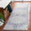 Tapis ivoire / bleu en laine et coton touffetés à la main ébène