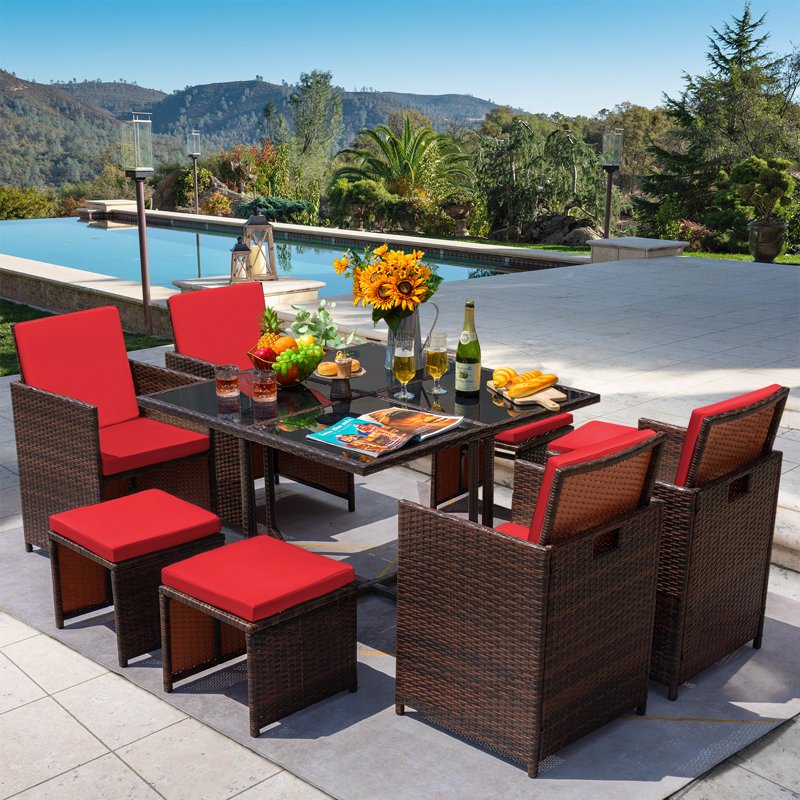 Angelos 8 - Person Wicker Patio Dining Set with Rectangular Table , Cushions Included, Red