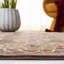 Heie Area Rug In Dark Brown