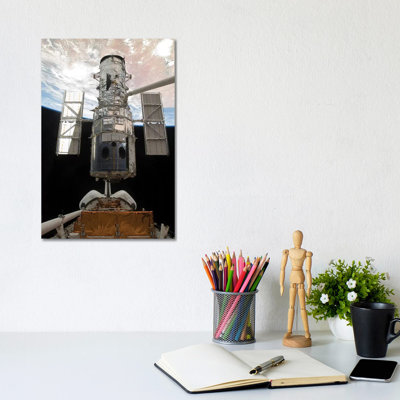 The Hubble Space Telescope Is Released From The Cargo Bay Of Space Shuttle Atlantis by Stocktrek Images - Wrapped Canvas Print