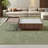 A mid-style walnut-colored coffee table set