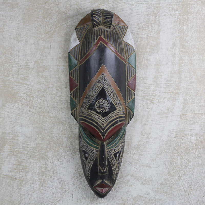 Masque en bois et aluminium obra africain
