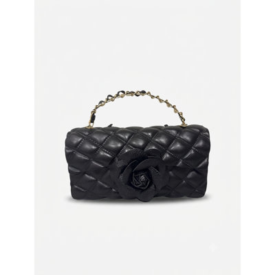 Bougie sculptée classique et noire Camelia