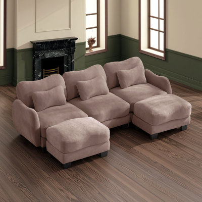 Canapé de coin avec deux poufs amovibles et trois coussins lombaires