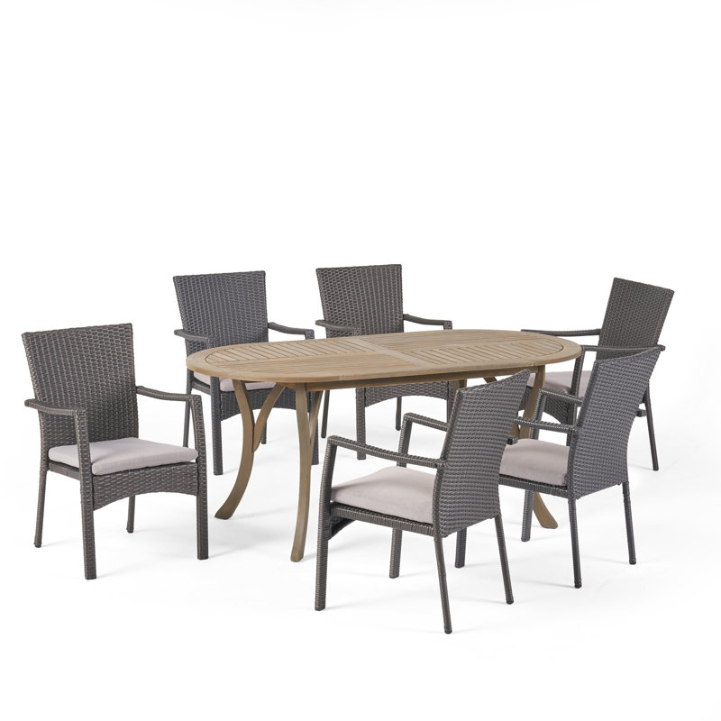 Eliger 6 - Person Acacia Wicker Patio Dining Set with Oval Table , Cushions Included