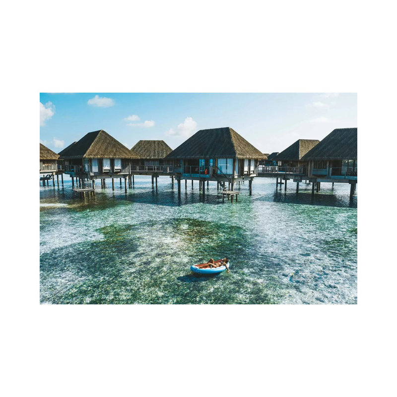 Maldives Resort Bungalows Girl Pool Float by James Vodicka - Wrapped Canvas Print, 20.32cm H x 30.48cm W 1.905cm D