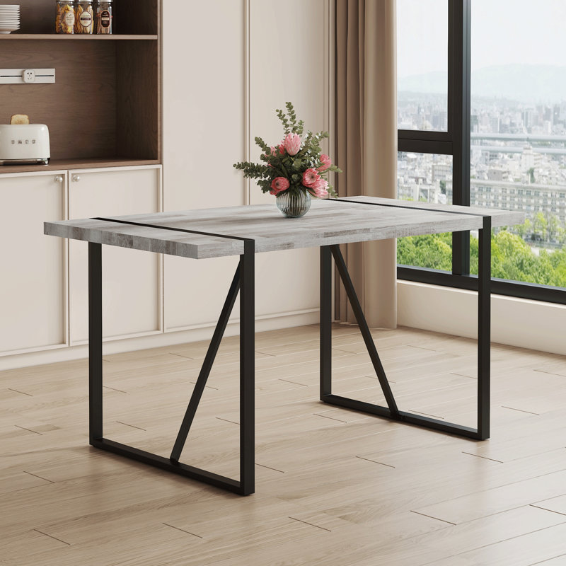 Table de salle à manger rectangulaire avec un dessus spécialement texturé et des pieds en métal, Gris