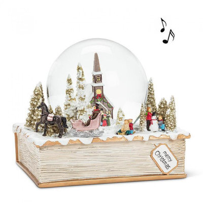 Globe à neige avec livre de contes
