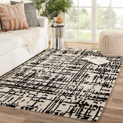 Abstract Handmade Tufted Area Rug in Cream