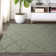 Nasturtium Solid Color Machine Tufted Polypropylene Area Rug in Sage